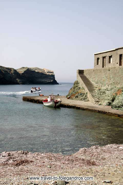 A small boat leaving Agios Georgios port FOLEGANDROS PHOTO GALLERY - Boat at Agios Georgios by Ioannis Matrozos