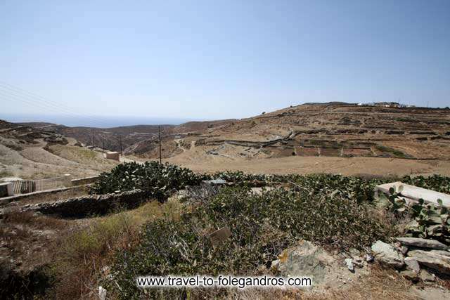 Ano Meria - View of the dry landscape of Ano Meria by Ioannis Matrozos