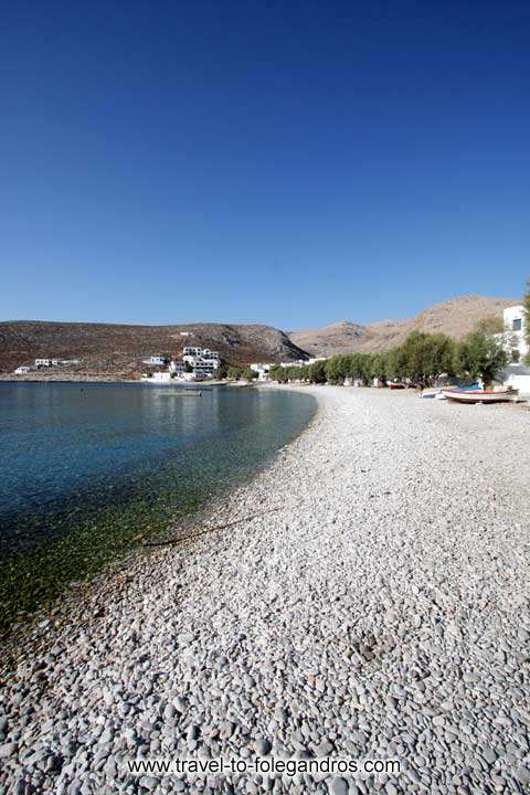 Chochlidia beach - Pine trees offer their shadow to the swimmer